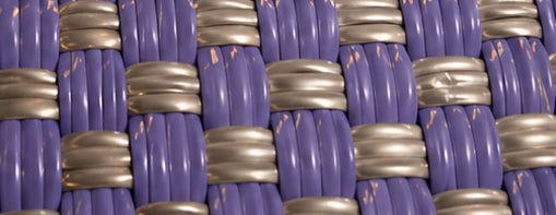 Close-up of the Stardust Gala Bag woven pattern using 100% recycled plastic.