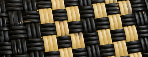 Close-up of the black and cream recycled-plastic weave of the Cookies and Cream GalaBag