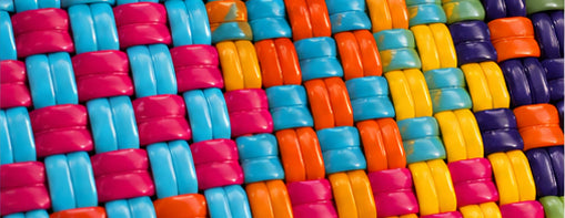 Pina Colada Gala Bag - colorful woven pattern with pink, blue, orange, yellow, and purple tiles.