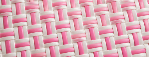 Close-up of pink and white woven pattern with Strawberry Shortcake Close Up.