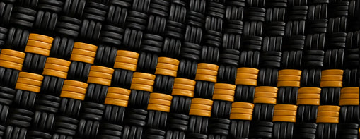 Close-up of The Flapper 100% Recycled Plastic Gala Bag woven pattern with black and gold colors